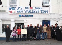 Protest banner hung from bank