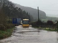 Road floods after brook bursts its banks