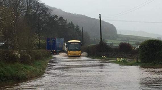 Road floods after brook bursts its banks