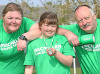 Nine-year-old climbs Pen y Fan three times in one day for nan