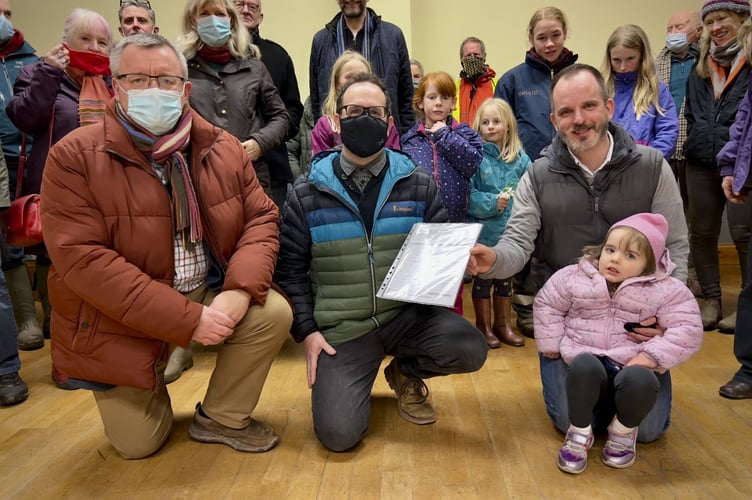 William Lloyd (centre) with Cllr William Powell (left) and Cllr Gareth Ratcliffe (right) with petition supporters