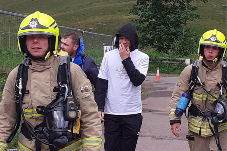 Stephen and Harry with supporters on the final day at Pen y Fan