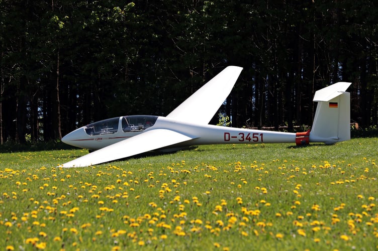 Glider in field