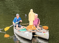 Virgin Mary sculpture floats down Wye in pollution demo