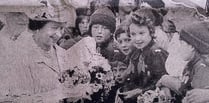 Queen showered with flowers after visit to Brecon Cathedral