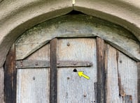 Historic bullet hole interests church visitors