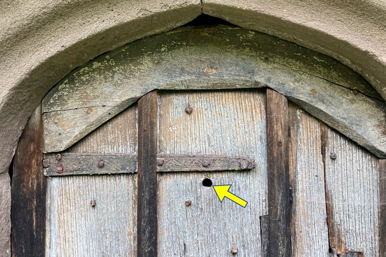 Llandetty door bullet hole