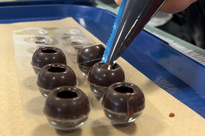 Vegan chocolate truffles being made at a Coco Live workshop.