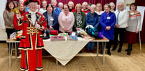 Llandrindod town crier rings a bell with Howey WI!