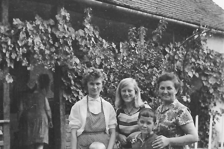 Bridget with a family in Romania.