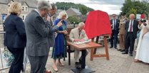 Why did King Charles and Queen Camilla visit Theatr Brycheiniog? 