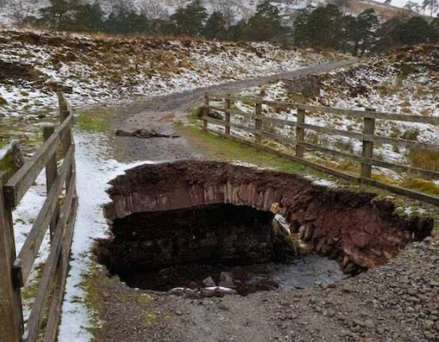 Giant hole in bridge