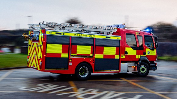 Fire crews tackle fire at Brecon property