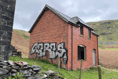 Investigation ongoing for graffiti left on Elan Valley estate building