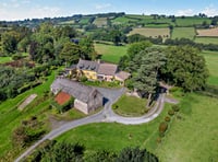 "Whimsical" property for sale has its own library and "idyllic" views 