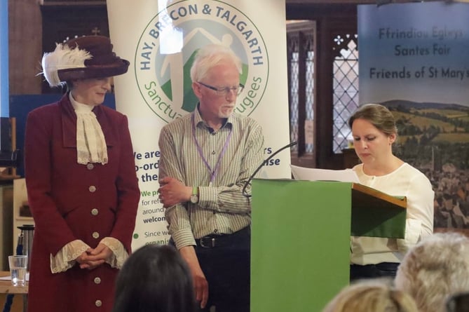 The High Sheriff with Rowland Jepson and Jo Scott- Lowe reading one of the winning entries. 