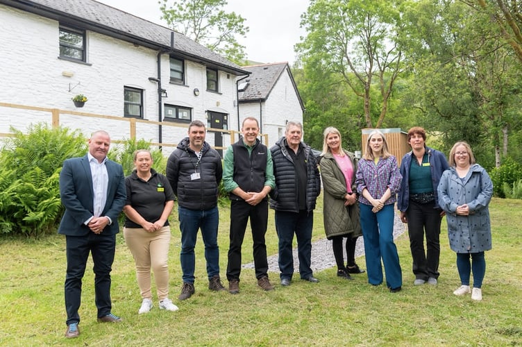 Sarah Murphy with YHA staff outside YHA Bannau Brycheiniog