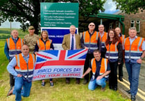 Landmarc raises the flag to mark the start of Armed Forces Week
