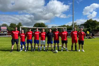 Brecon football match raises £2,770 for charity