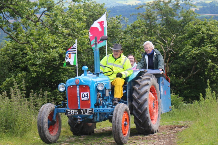 Llanwrtyd Wells' James Davies and family with his Dexta