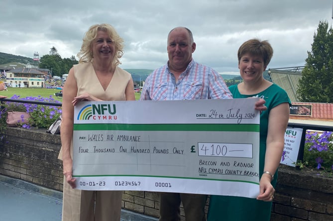 Dr Sue Barnes, Wales Air Ambulance Chief Executive, NFU Cymru Brecon & Radnor County Chairman Rob Powell and his wife, Tracy Powell