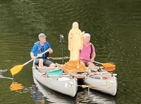 Virgin Mary sculpture to return to river in pollution protest