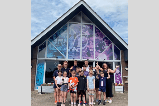 Staff and customers outside Brecon Leisure Centre