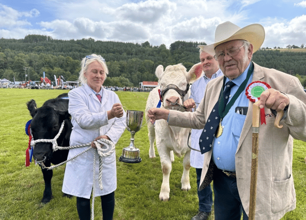 The President, Mr Frank Sutton and Annie Lewis with her prize-winning commercial heifer “Miss Dior”