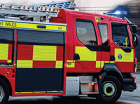 Fire crews tackling large barn fire in Powys