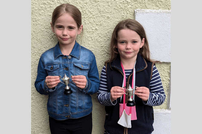 Sisters, Bronwen and Lowri Davies, Llanwrtyd, with their trophies