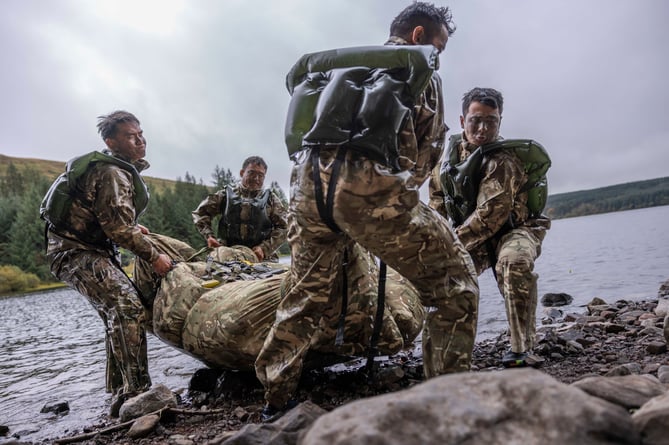 Gurkha soldiers from Gurkha Company (Satang) lift their heavy kit out of the water prior to completing the river crossing phase of EXERCISE CAMBRIAN PATROL 2024.

Soldiers from across the world are readying themselves for the ultimate challenge of military fieldcraft, navigation, tactics, leadership skills and teamwork.
This all takes place across the undulating terrain of Bannau Brycheiniog (Brecon Beacons) where Exercise Cambrian Patrol has had its roots since 1959.

Around 1,000 troops, spread across eight phases of the event, will be faced with a mock mission that includes covering more than 40 miles from east to west, dealing with enemy threats and various other challenges.

Lieutenant Colonel Will Peltor, Officer Commanding this year's event, said: ÒAs we mark the 65th year since the first Exercise Cambrian Patrol took place itÕs important to note that the event maintains its core standards and is as relevant today, in the modern operational environment, as it was for Territorial Soldiers nearly seven decades ago when they were being tested on their Cold War readiness.