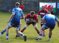 Brecon survive late scare in away win