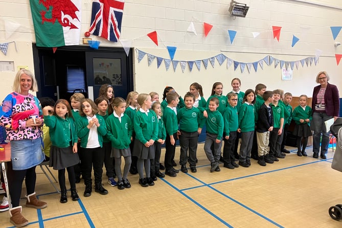 The school choir from Llangynidr entertained the guests