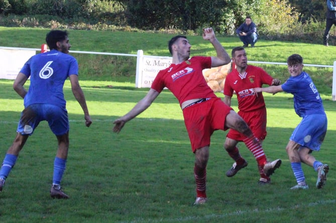 Joel Evans' late glancing header secured all three points for Brecon Corries 