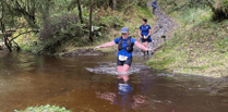 Runners brave the rain in memorial race