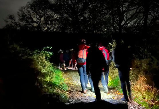 Rescuers aid injured waterfall walker