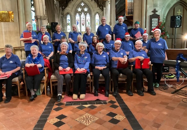 The Bracken Singers spread festive cheer at Holy Trinity Church during the The Bracken Trust’s Christmas Fair