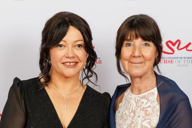 Catherine Davies (left) with line manager Hayley Tarrant at the ceremony