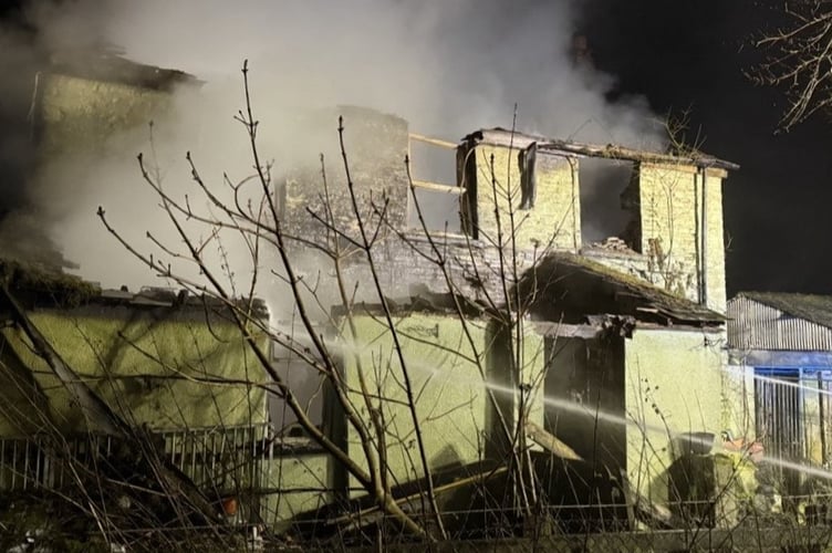 The roof and one wall of the property collapsed in the fire