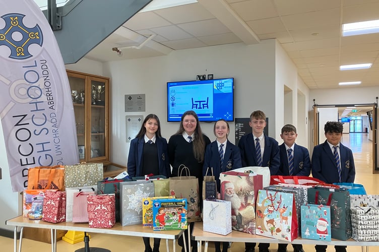 Pupils from Brecon High School gather with their thoughtful donations,