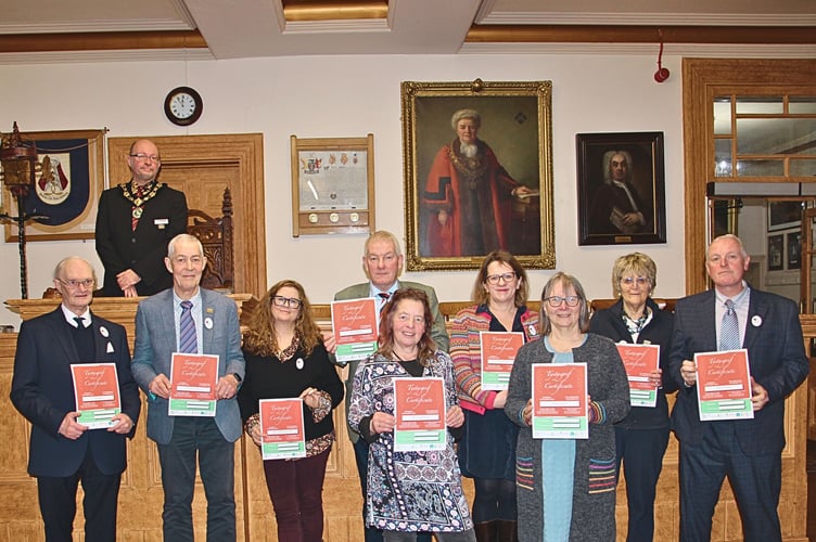 Brecon’s newly qualified guides celebrate their achievement at the Guildhall